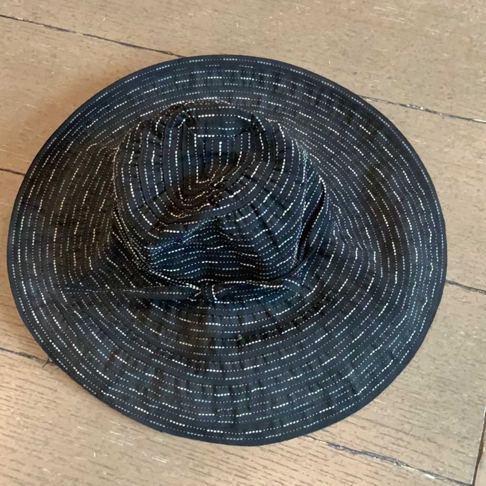Black sun hat with colorful detail.